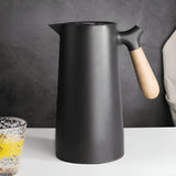 Groene Thermoskan met Houten Handvat