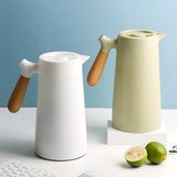 Groene Thermoskan met Houten Handvat