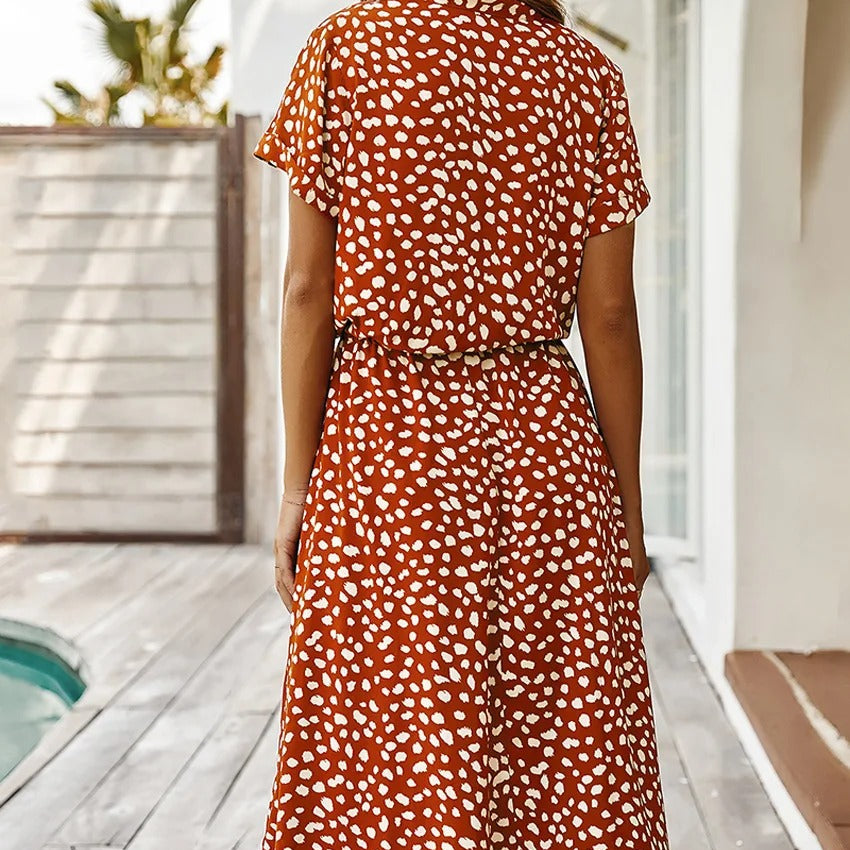 Oranje-Rode Midi Jurk met Dierenprint en Taillekoord.