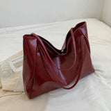 Ruime schoudertas voor dames, minimalistisch design