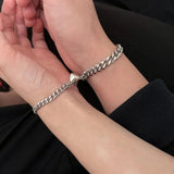 Koppelarmbanden Zilver met Hartverbinding