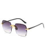 Luxe Randloze Zonnebril met Gradient Glazen voor Elegante Look