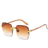 Luxe Randloze Zonnebril met Gradient Glazen voor Elegante Look