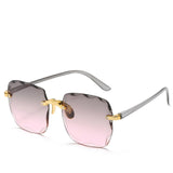 Luxe Randloze Zonnebril met Gradient Glazen voor Elegante Look