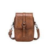 Compacte crossbody tas met verstelbare schouderband en gespsluiting