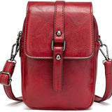 Compacte crossbody tas met verstelbare schouderband en gespsluiting