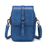 Compacte crossbody tas met verstelbare schouderband en gespsluiting