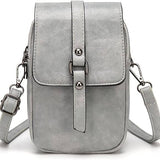 Compacte crossbody tas met verstelbare schouderband en gespsluiting