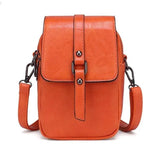 Compacte crossbody tas met verstelbare schouderband en gespsluiting